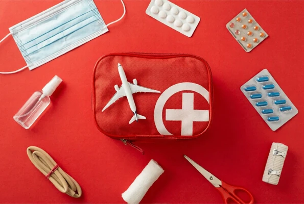 Portable first aid kit with essential medical supplies for use during travel and emergencies